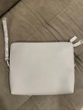 the mumi x NEAT Method collaboration Travel Clutch
